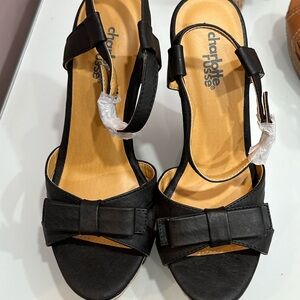 NEW! black wedges in size 6.